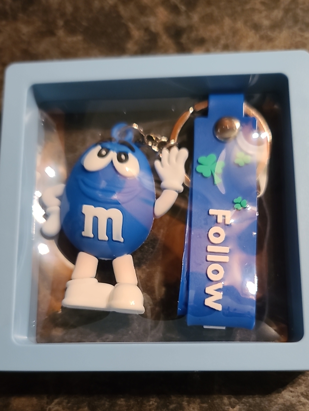 M&M'S Blue Character Keychain with 'Follow' Strap